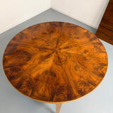 Round walnut Napoleon III extendable table with bronze top in good condition.