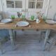 Vintage farm table, base and belt re-enchanted in verdigris, wooden top.