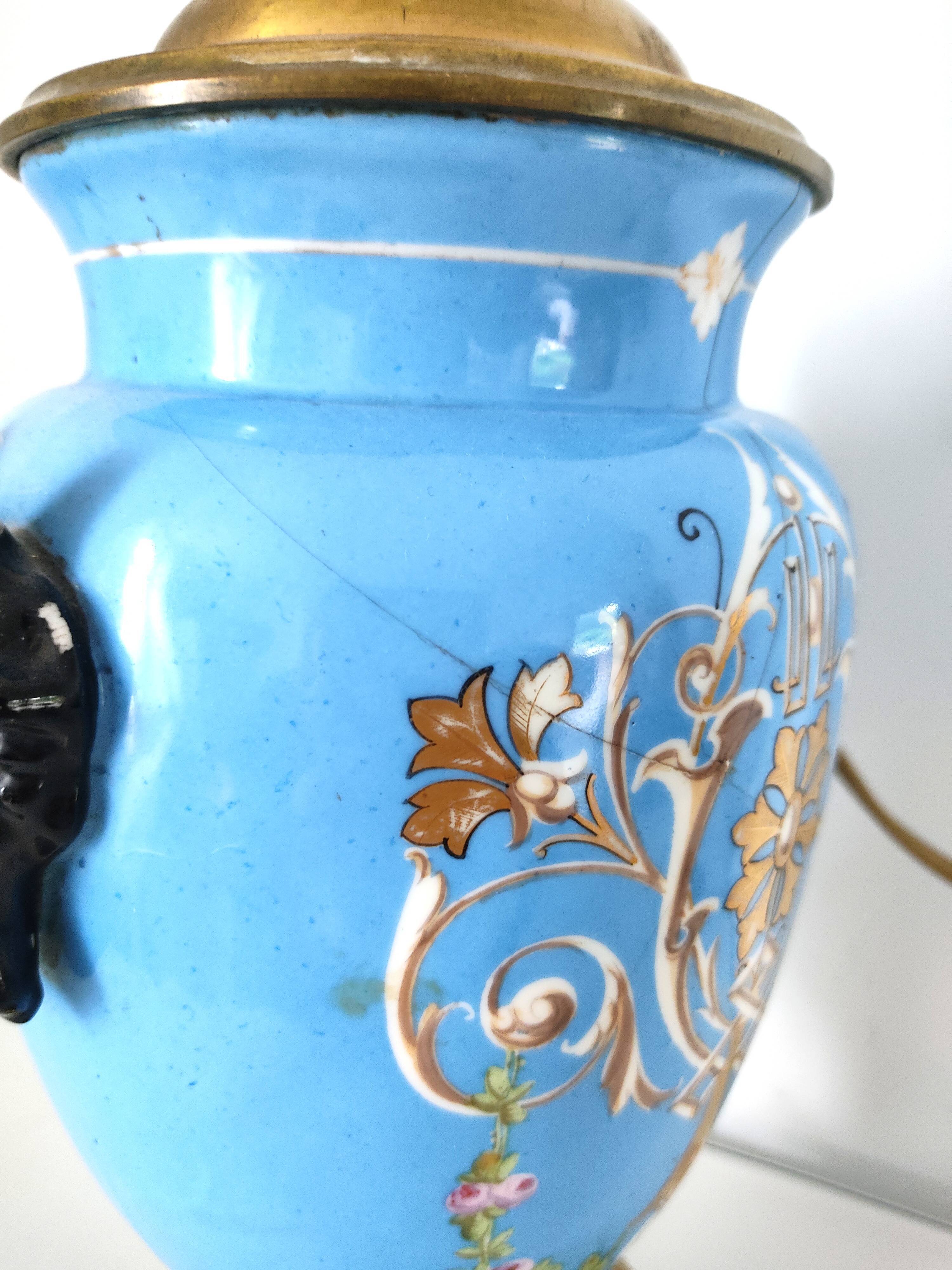 Lamp foot blue vase heads of fauna