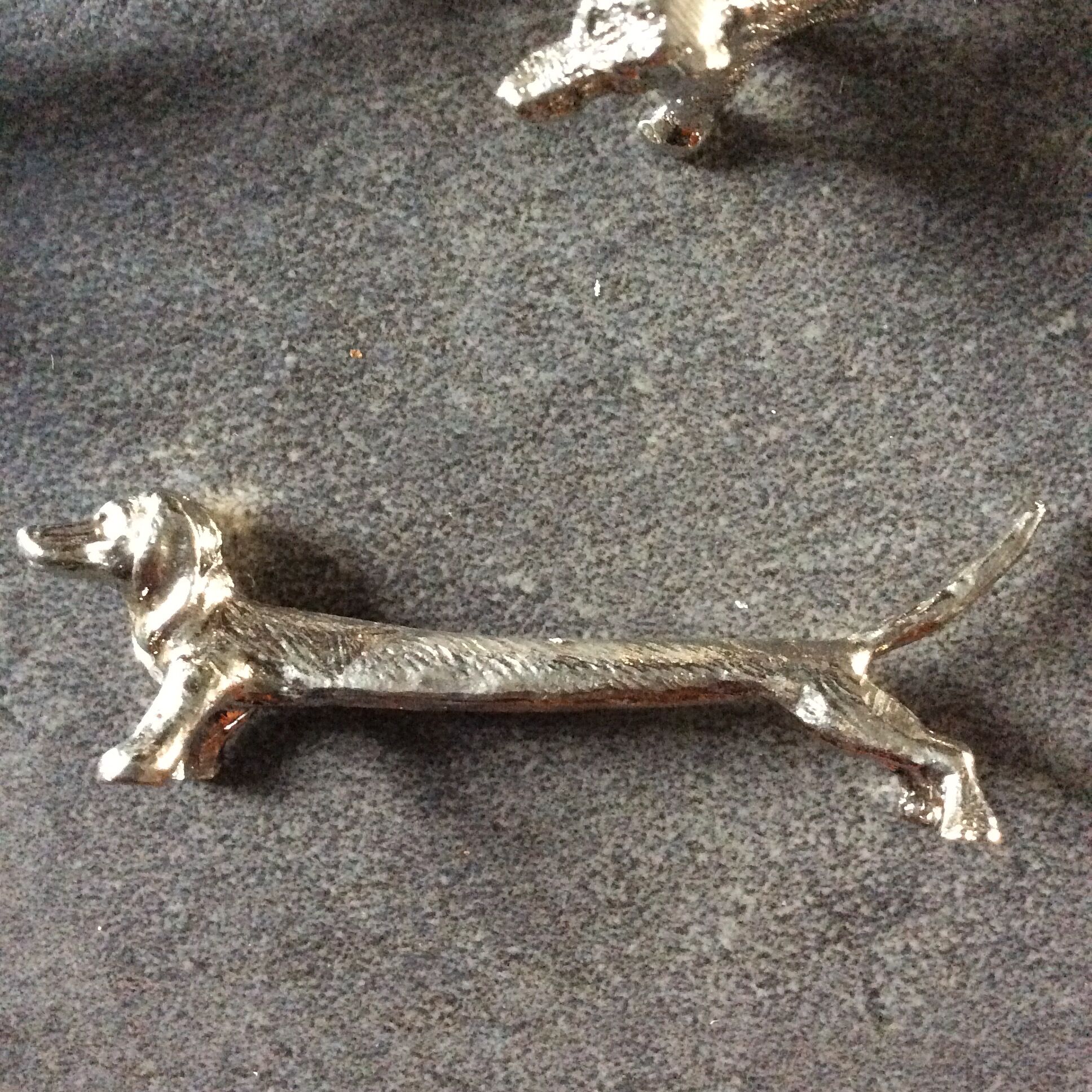 Series of 12 vintage knife holders dogs in silver metal