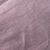 Old linen tablecloth tinted in lilac
