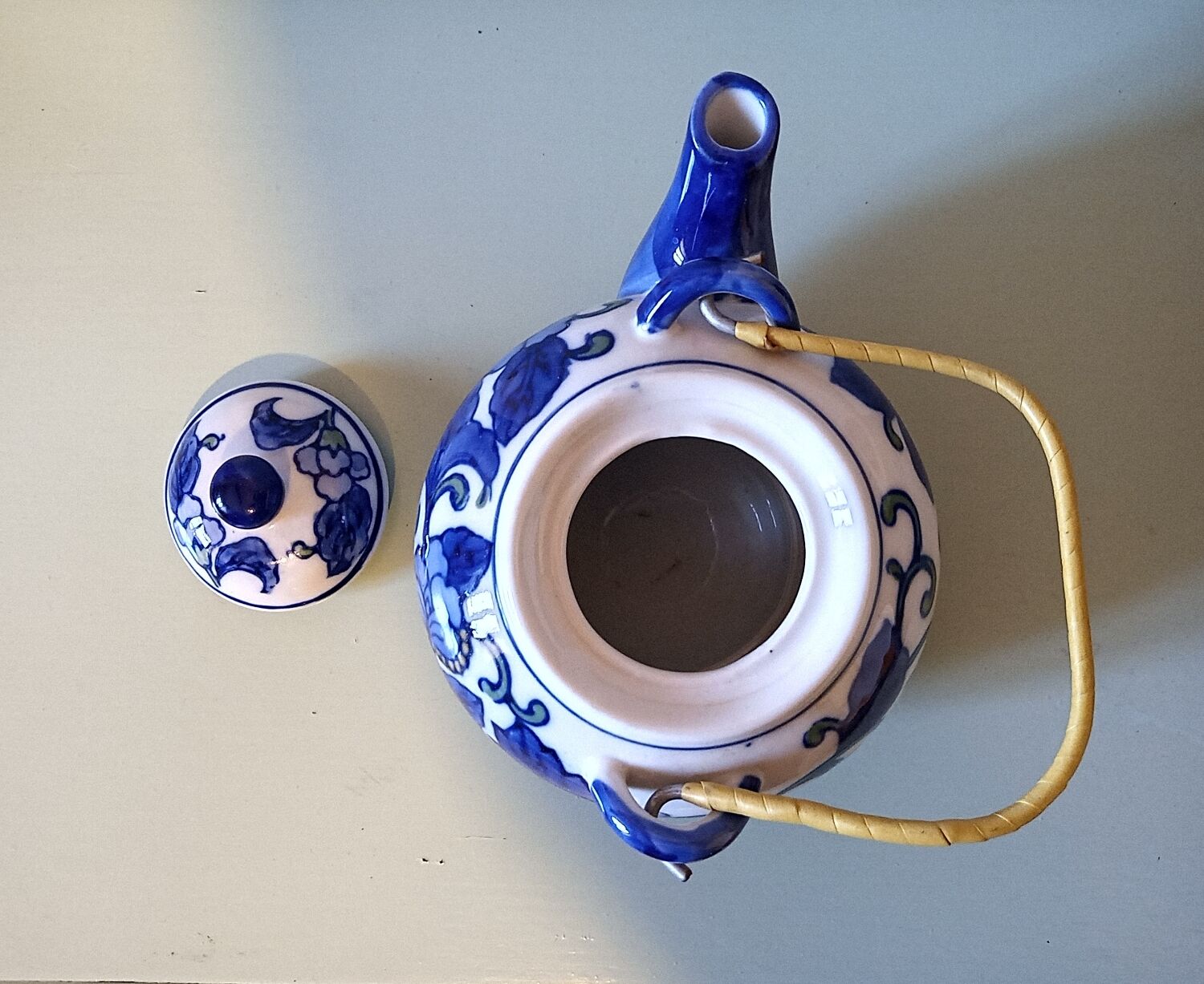 Hand-painted blue floral pattern teapot