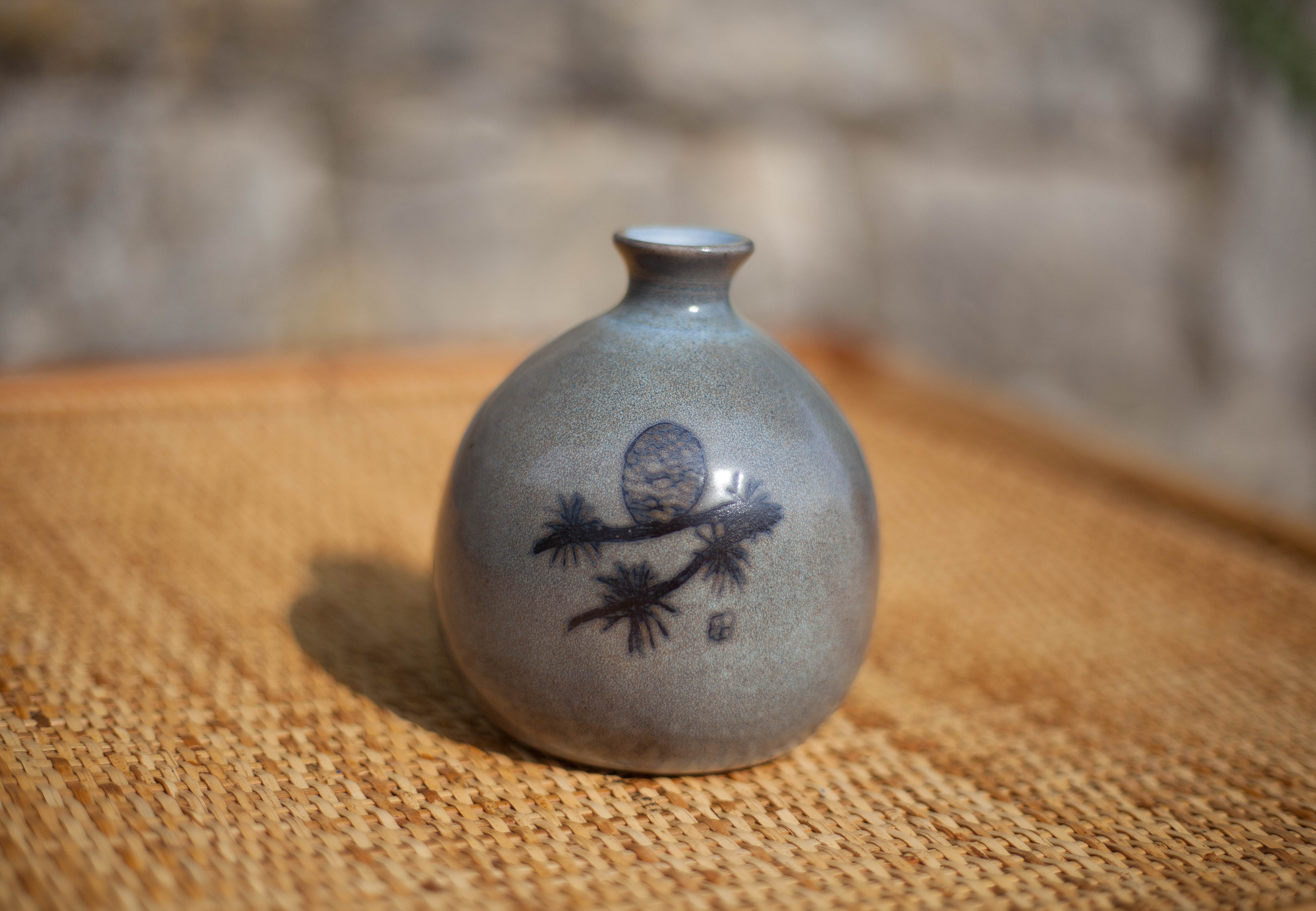 Glazed terracotta ball vase