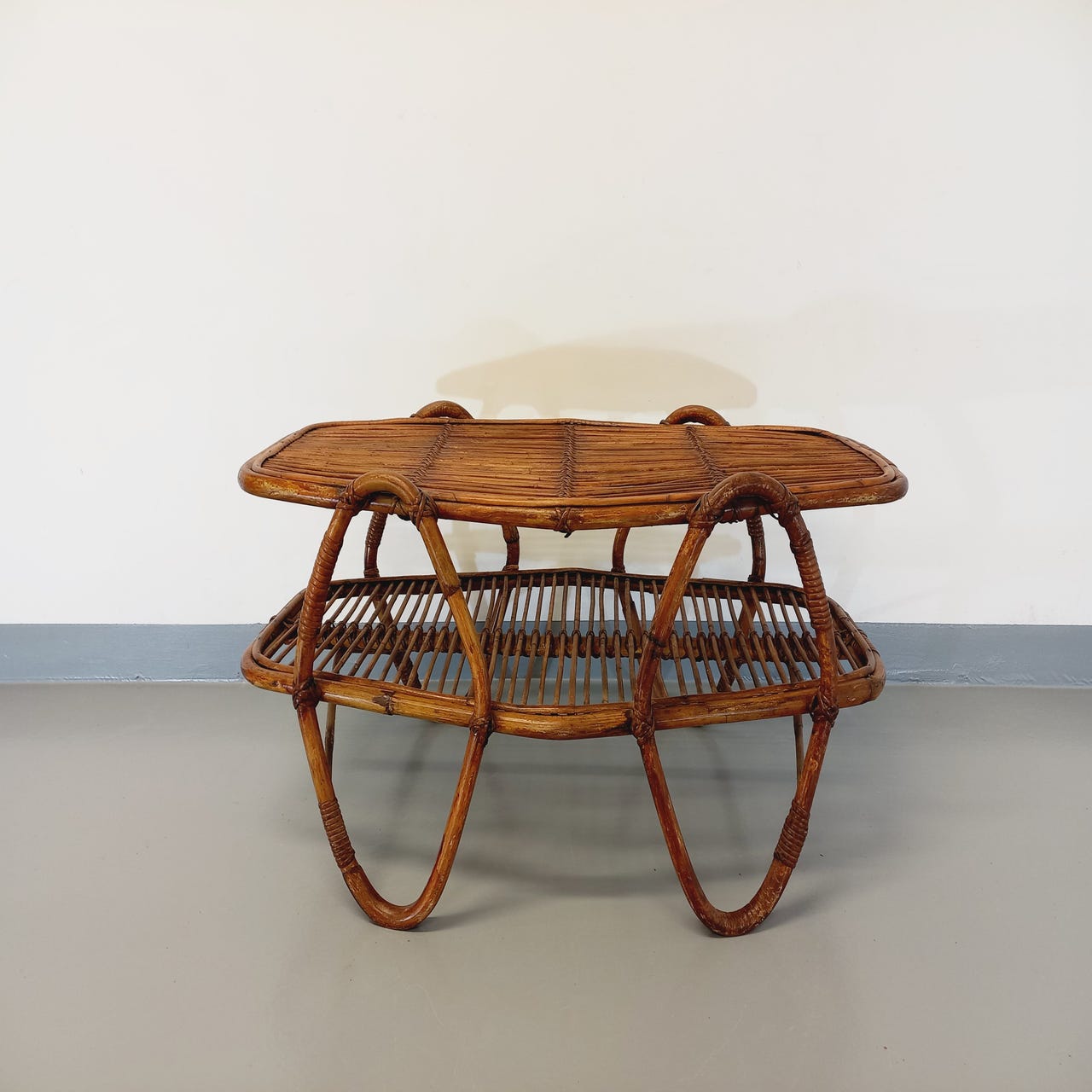 Coffee table with magazine tray in vintage rattan from the 60s