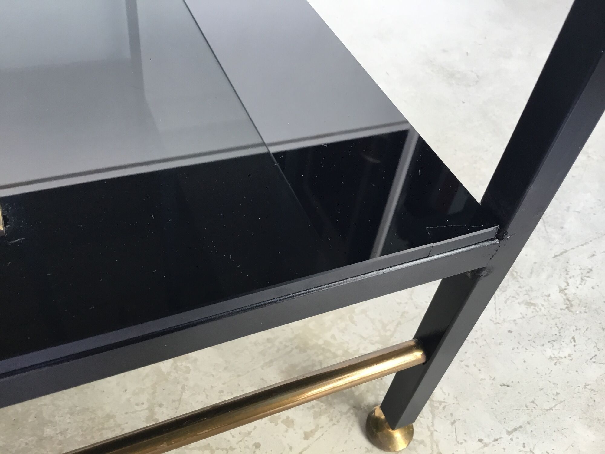 Modernist coffee table in metal tubular base and glass top 1950