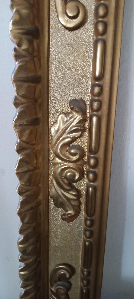 Miroir ancien en bois doré
