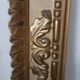 Miroir ancien en bois doré