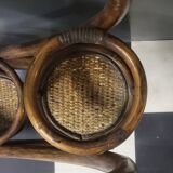 Authentic vintage wicker rattan plant stand planter.