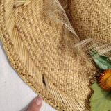 Decorative straw hat with dried flowers