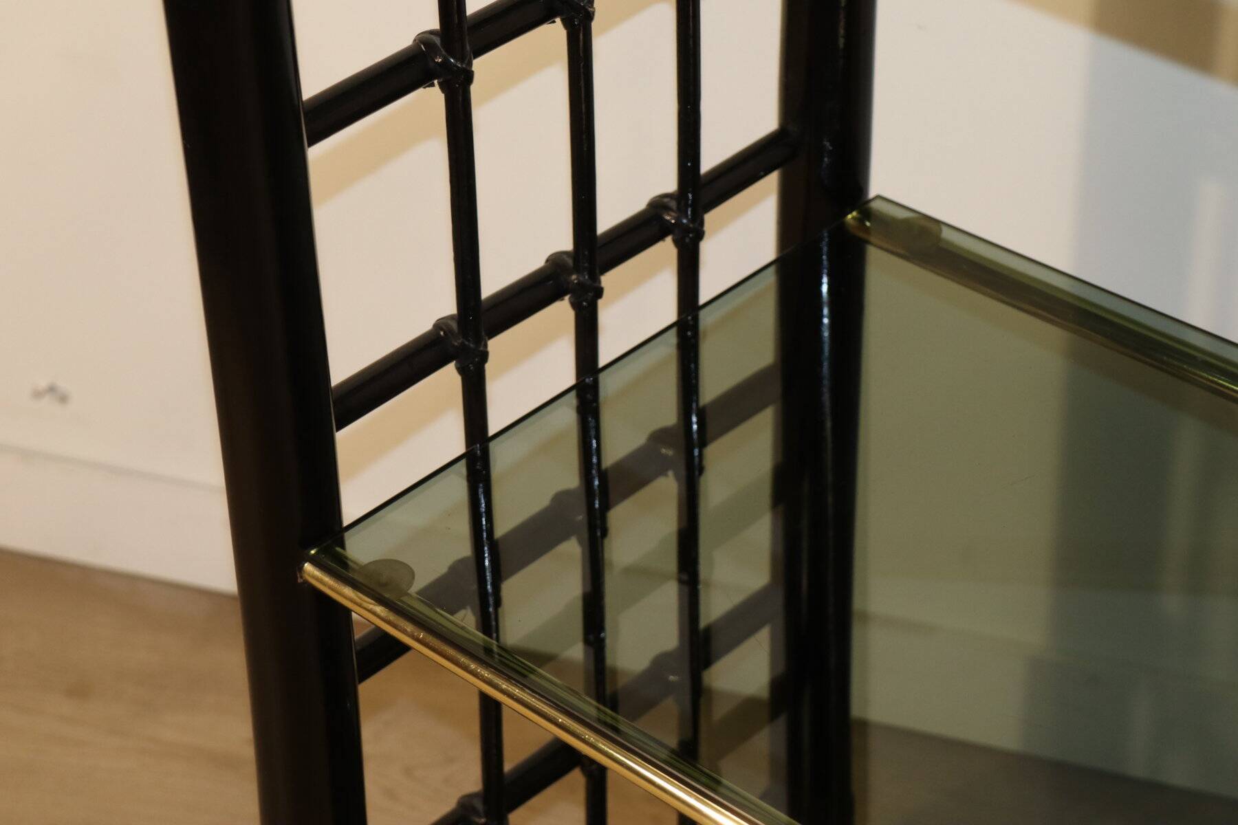 Vintage 1970s shelf in smoked glass with a bamboo-style structure.