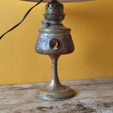Repoussé brass lamp with floral motifs, decorated with 3 miniature medallions