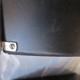 Modernist chair in chromed metal and black imitation leather