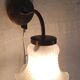 Swan neck wall lights in brass and glass - mid 20th century.