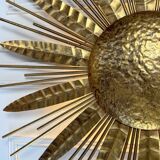 Large golden hammered metal sun wall light with a diameter of 90 cm from the year