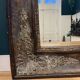 Very large mirror with a vintage effect.