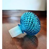 Bouteille en verre bleu belge vintage