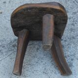 three-legged milking stool made of olive tree folk art