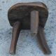 three-legged milking stool made of olive tree folk art