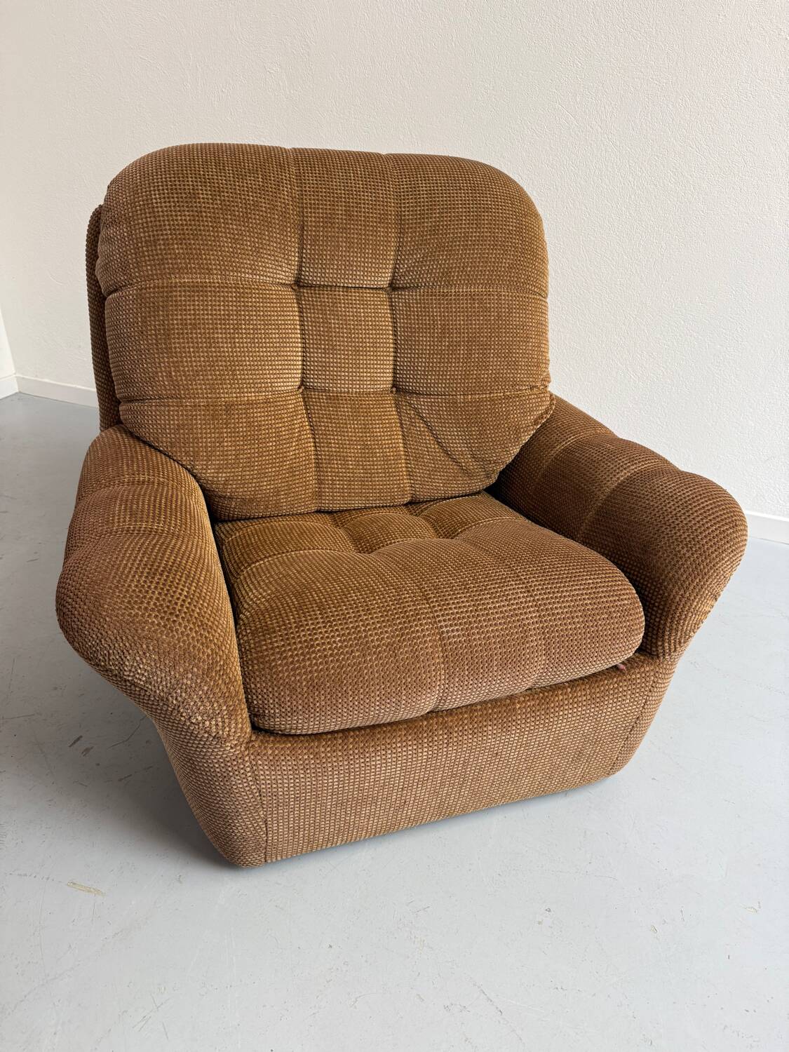Old vintage 60s fabric lounge chair