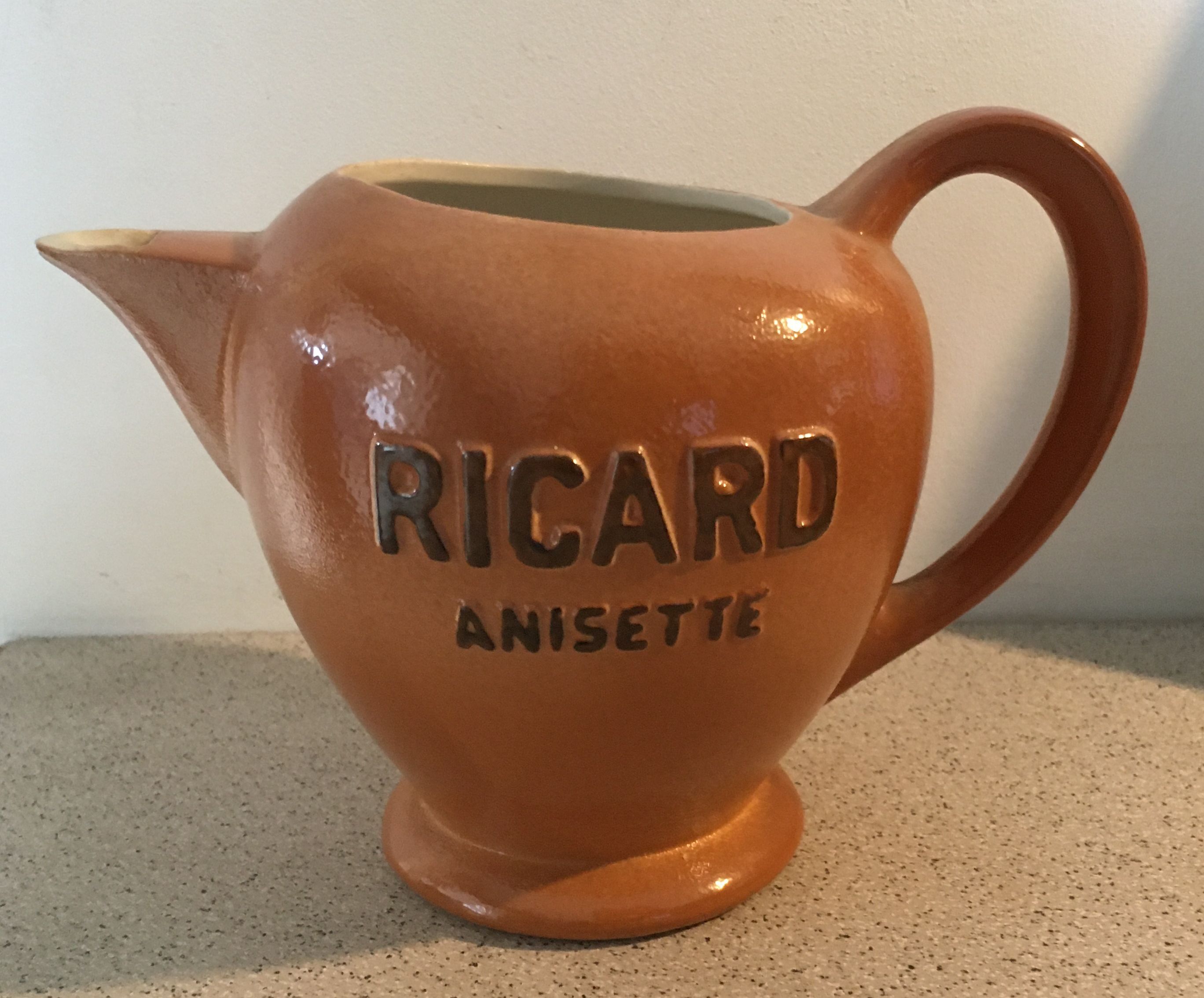 Ricard round ceramic carafe 1 liter a small chip