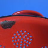 Vintage red enameled sheet metal colander