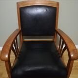 Colonial armchair in teak and black leather
