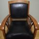 Fauteuil colonial en teck et cuir noir