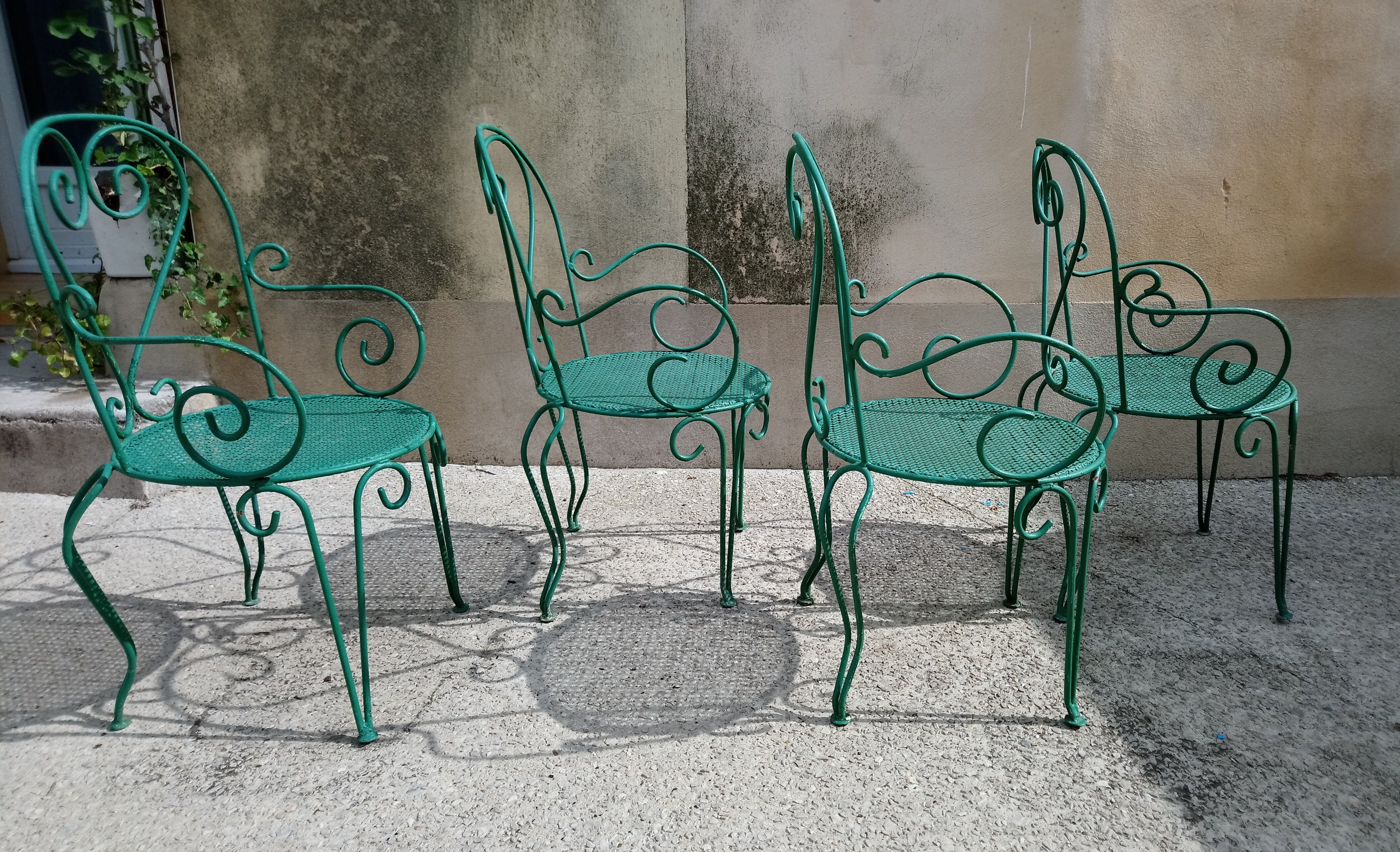 Suite de 4 fauteuils de jardin années 60