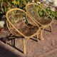 Pair of 1950s rattan armchairs from France.