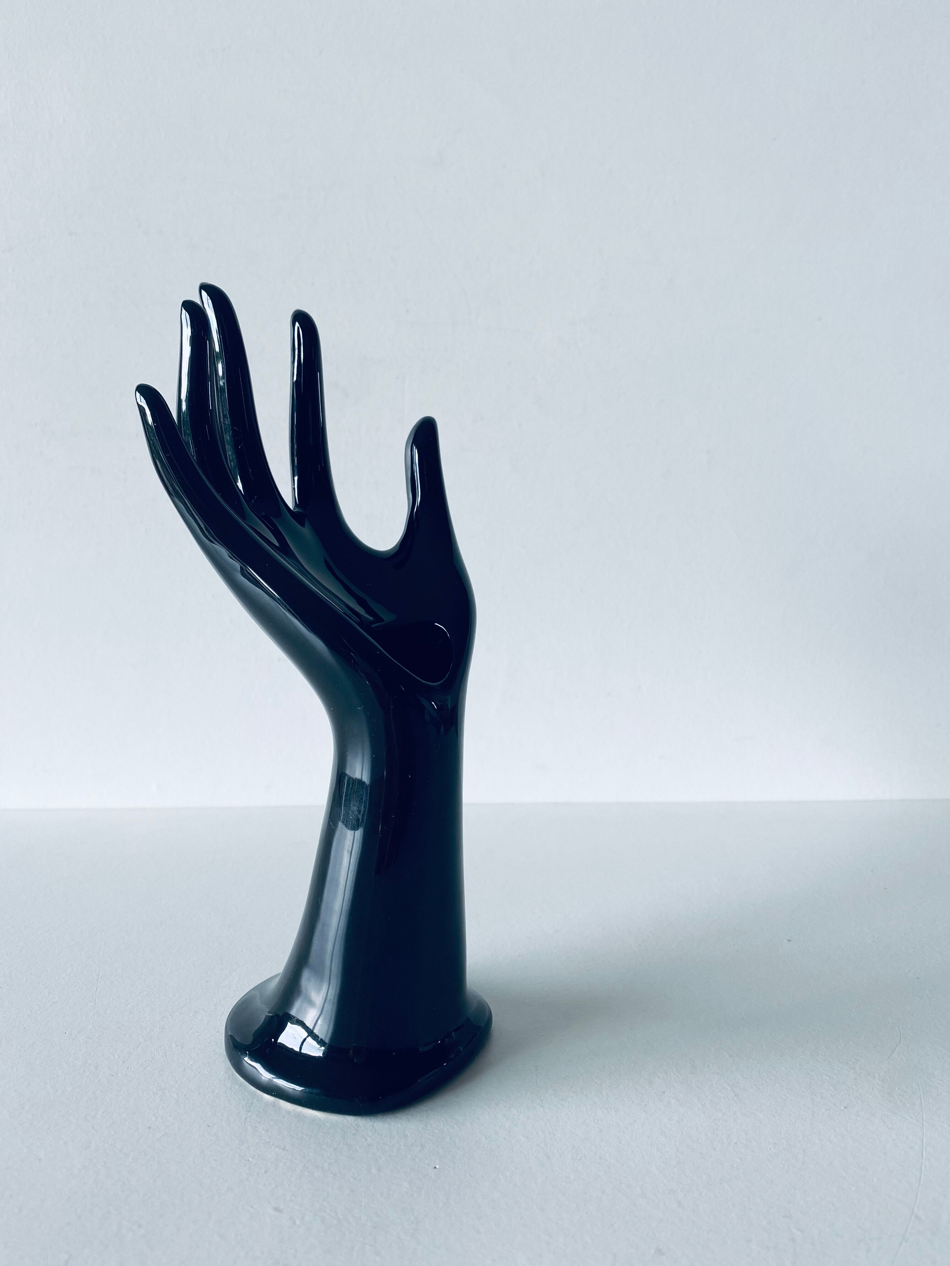 Hand vase and ceramic jewelry holder