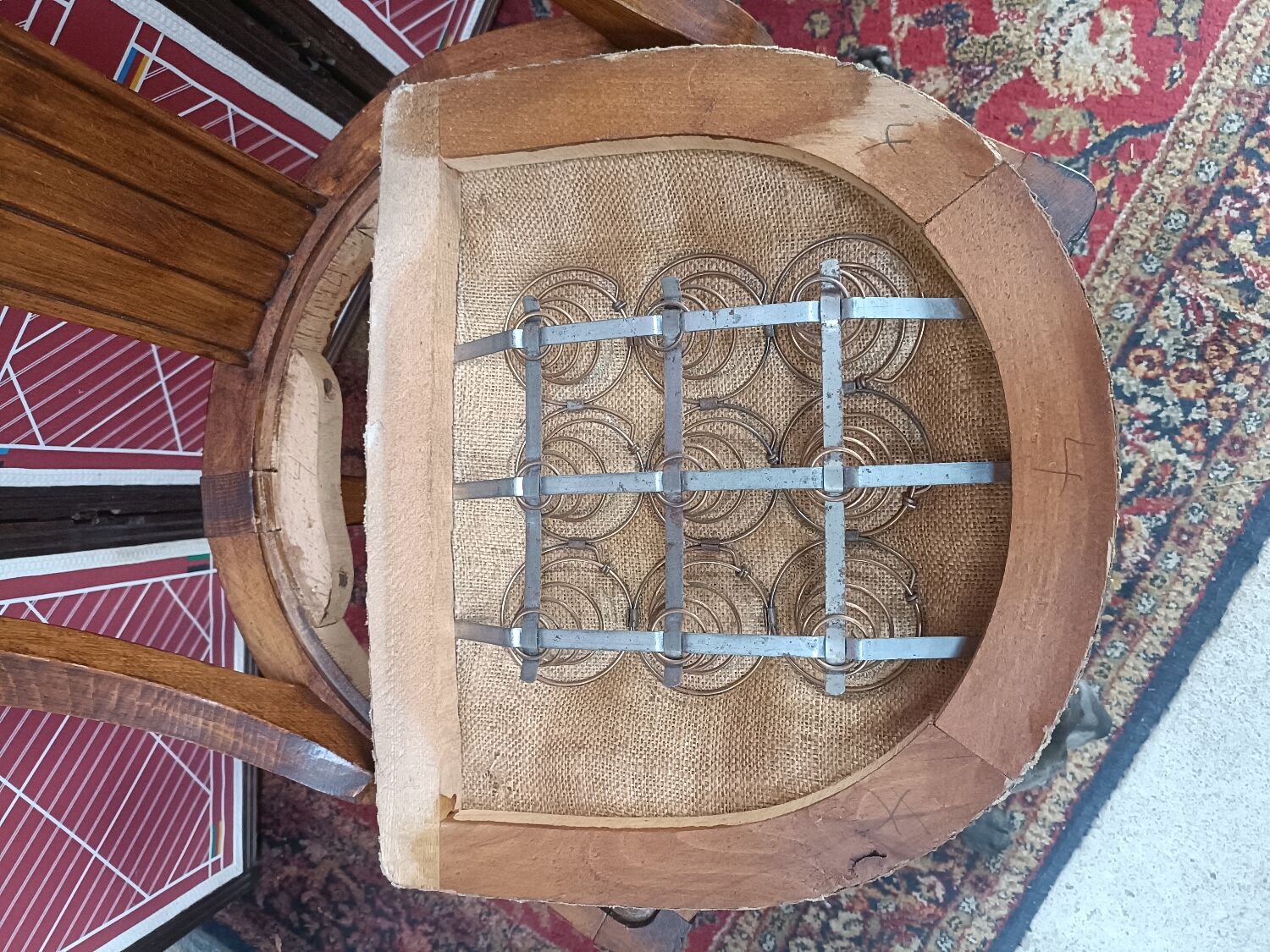 Gondola chair with art-deco motifs, spring leatherette seat