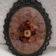 Herbier ovale vintage en laiton