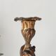 Antique 19th-century solid gilded bronze candlestick in the Louis XV style.