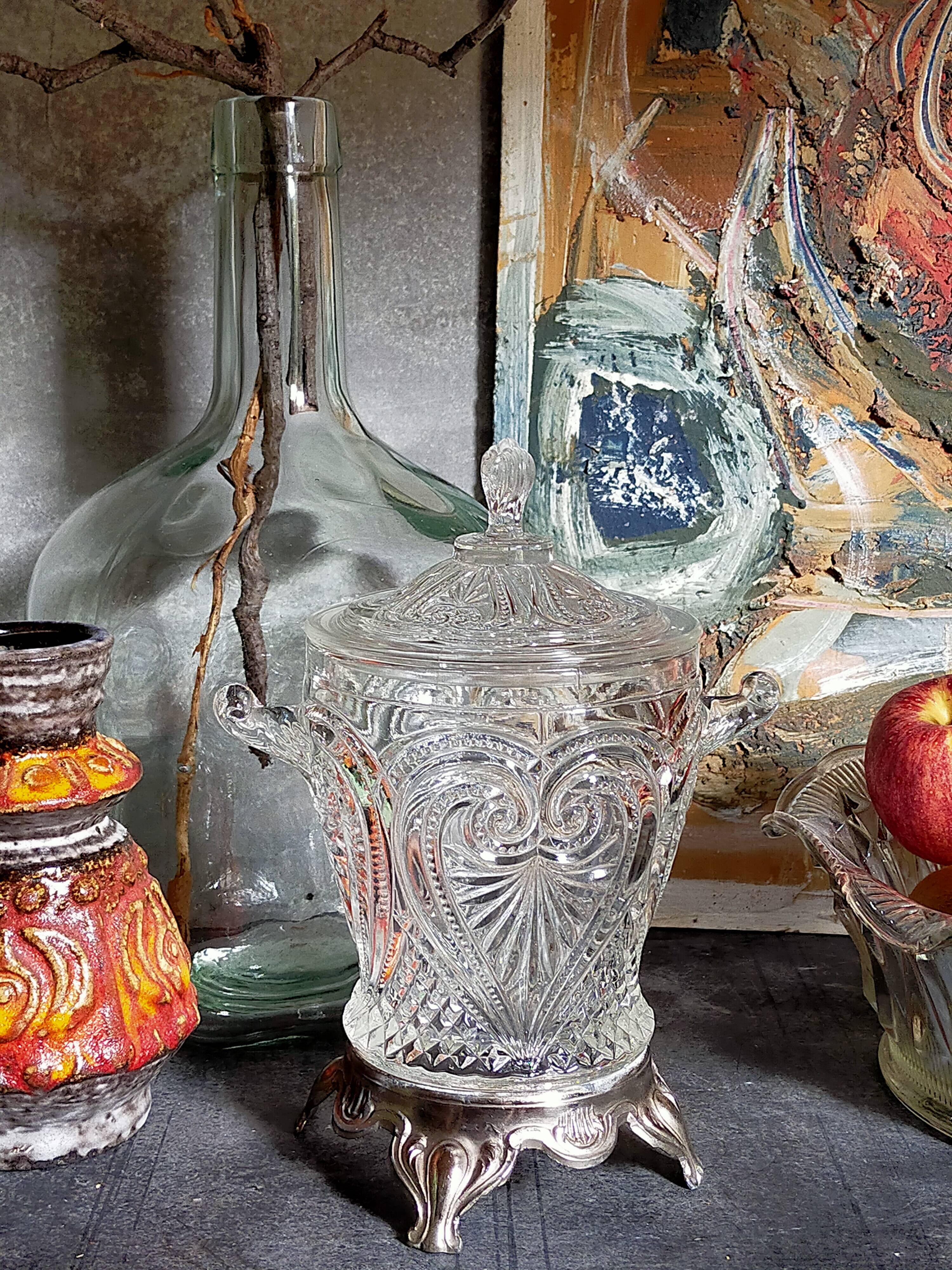 Antique glass compotier on metal stand