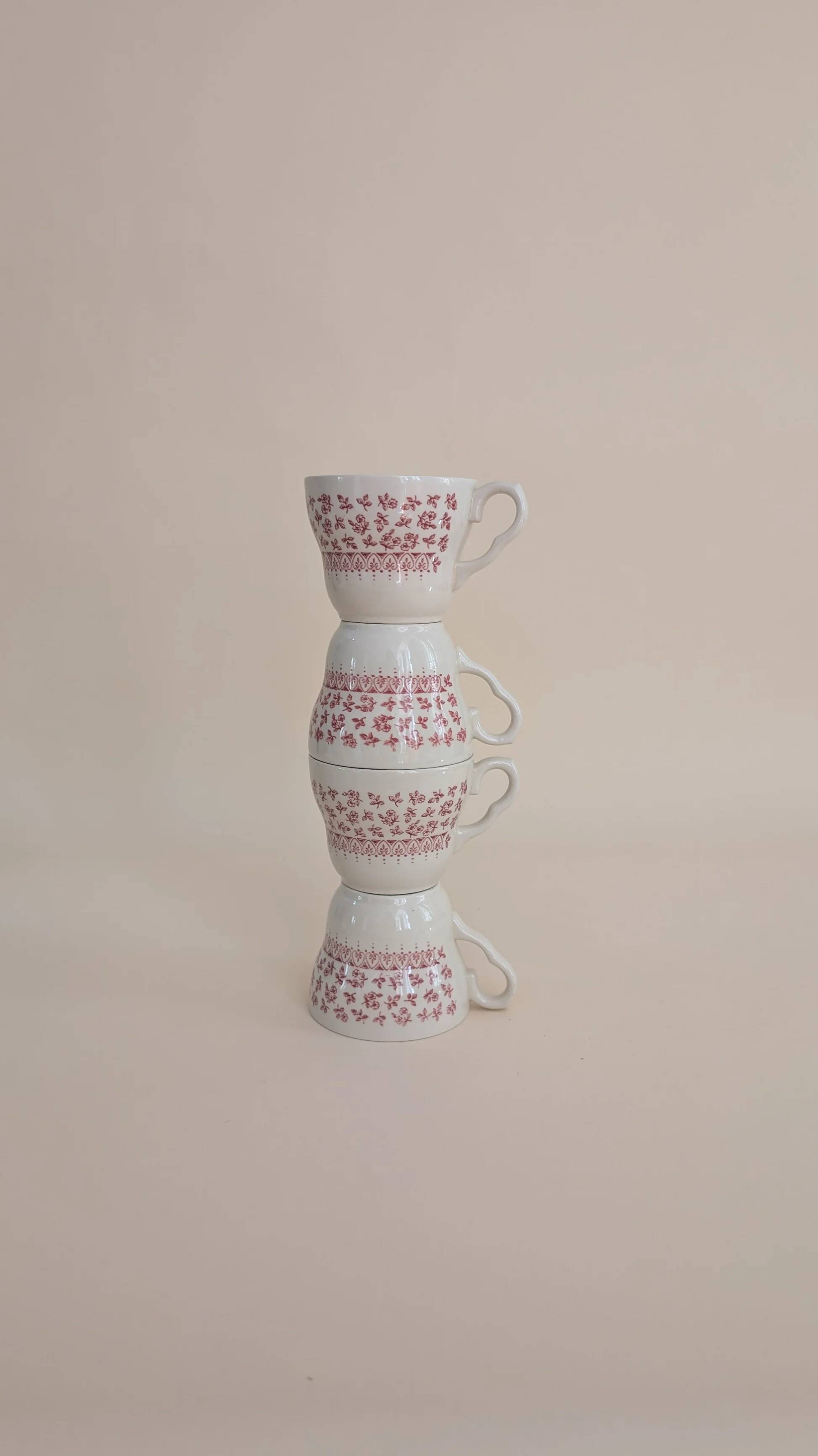 Set of 4 red ceramic mugs