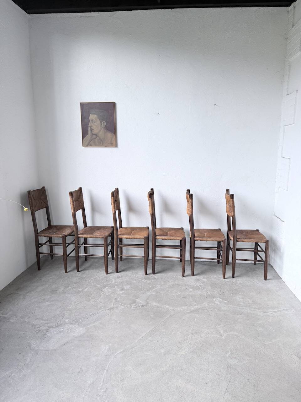 Set of 6 straw and oak Beauche chairs.