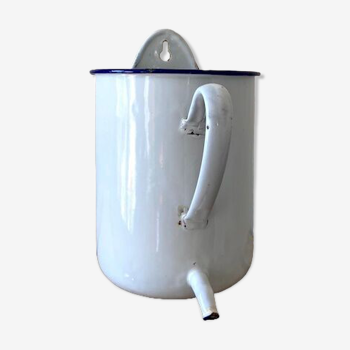 Old white and blue enamelled enema pot
