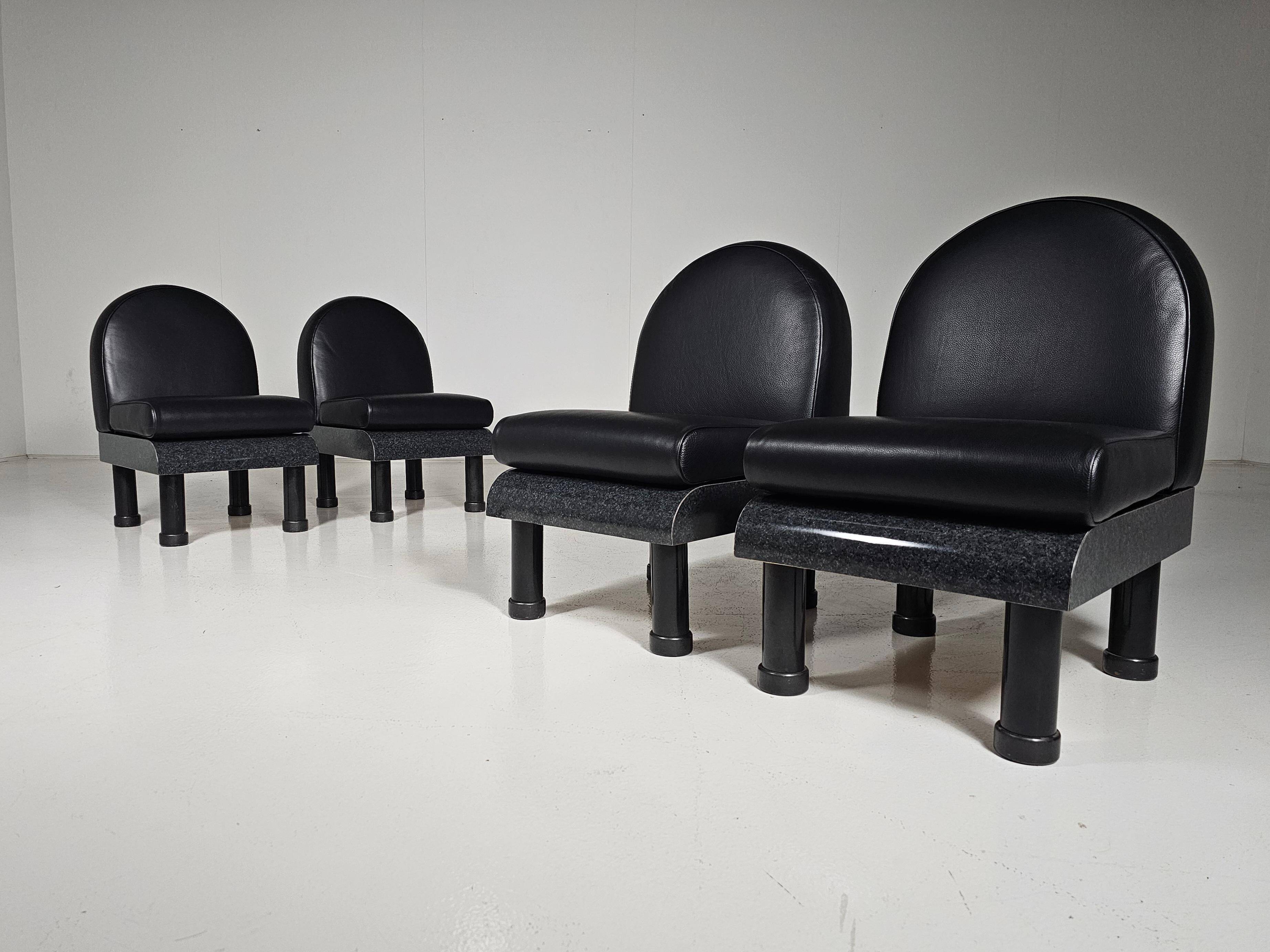 Black leather loungers , 1980.