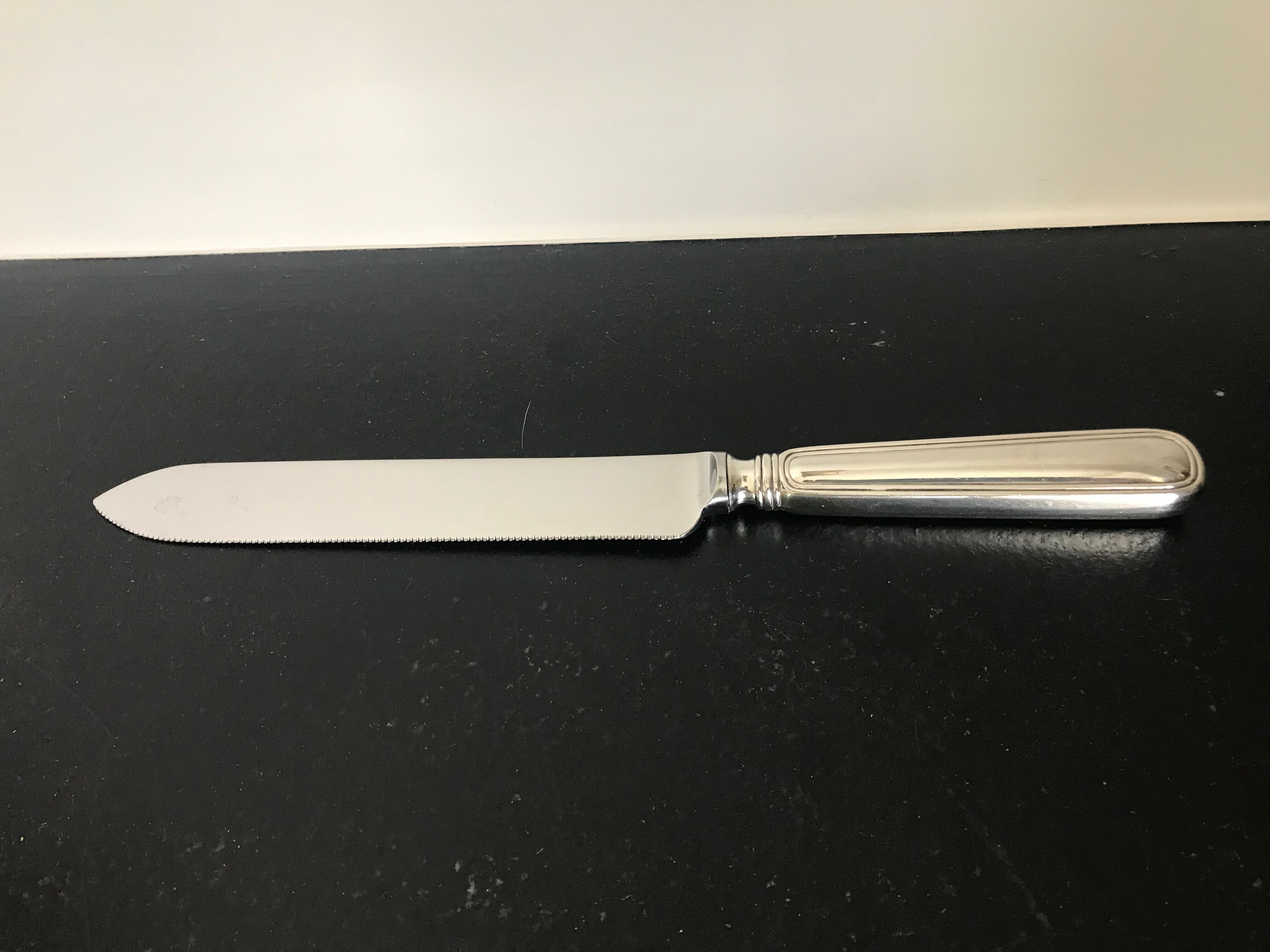 Silver metal bread knife