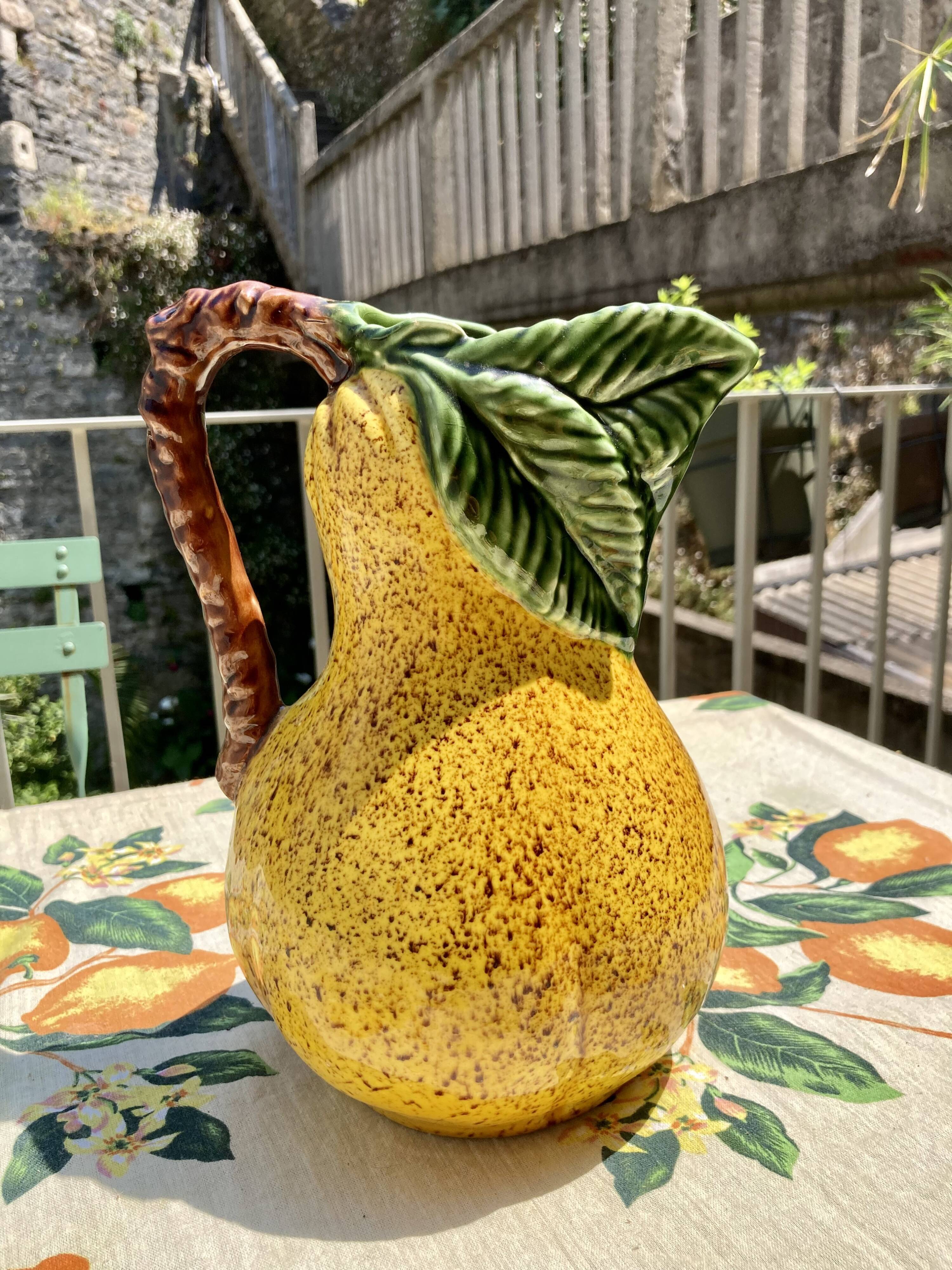 Pitcher in the shape of fruit, pear, slip