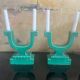 Set of 2 Art Deco candlesticks in green earthenware