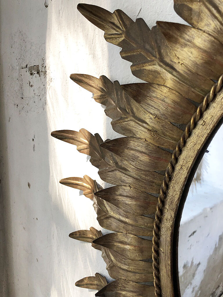 Golden mirror ancient flowery sun