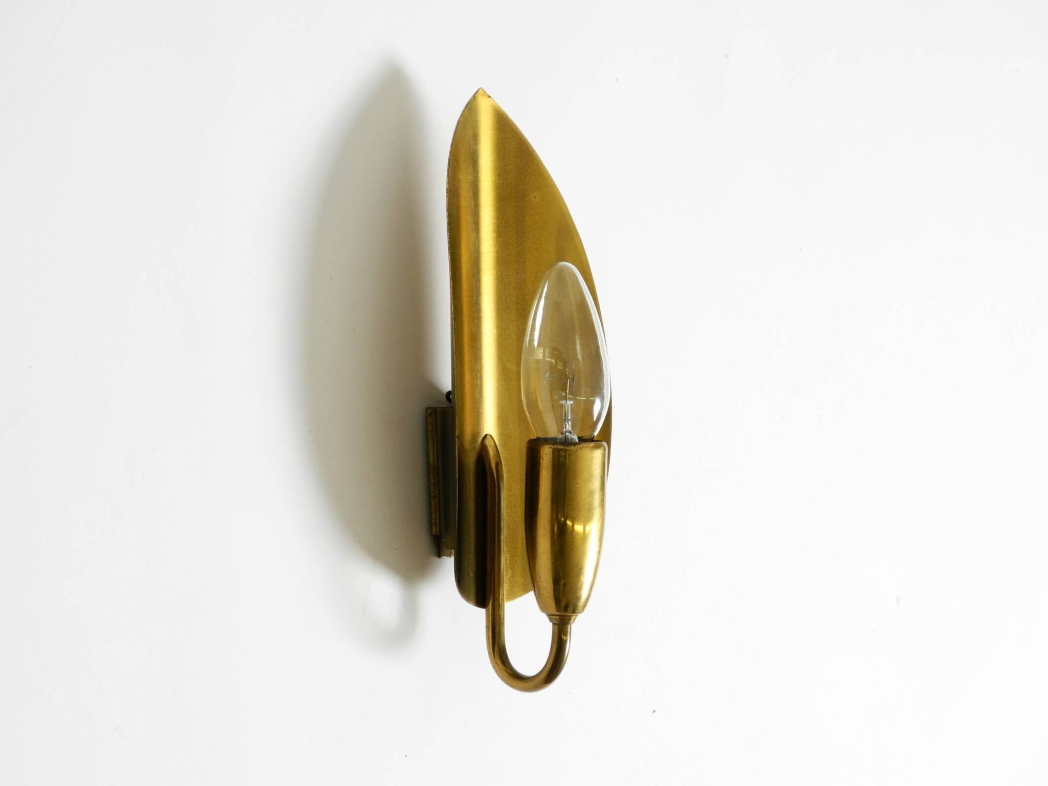 Beautiful original Mid Century Modern cone wall lamp made of brass