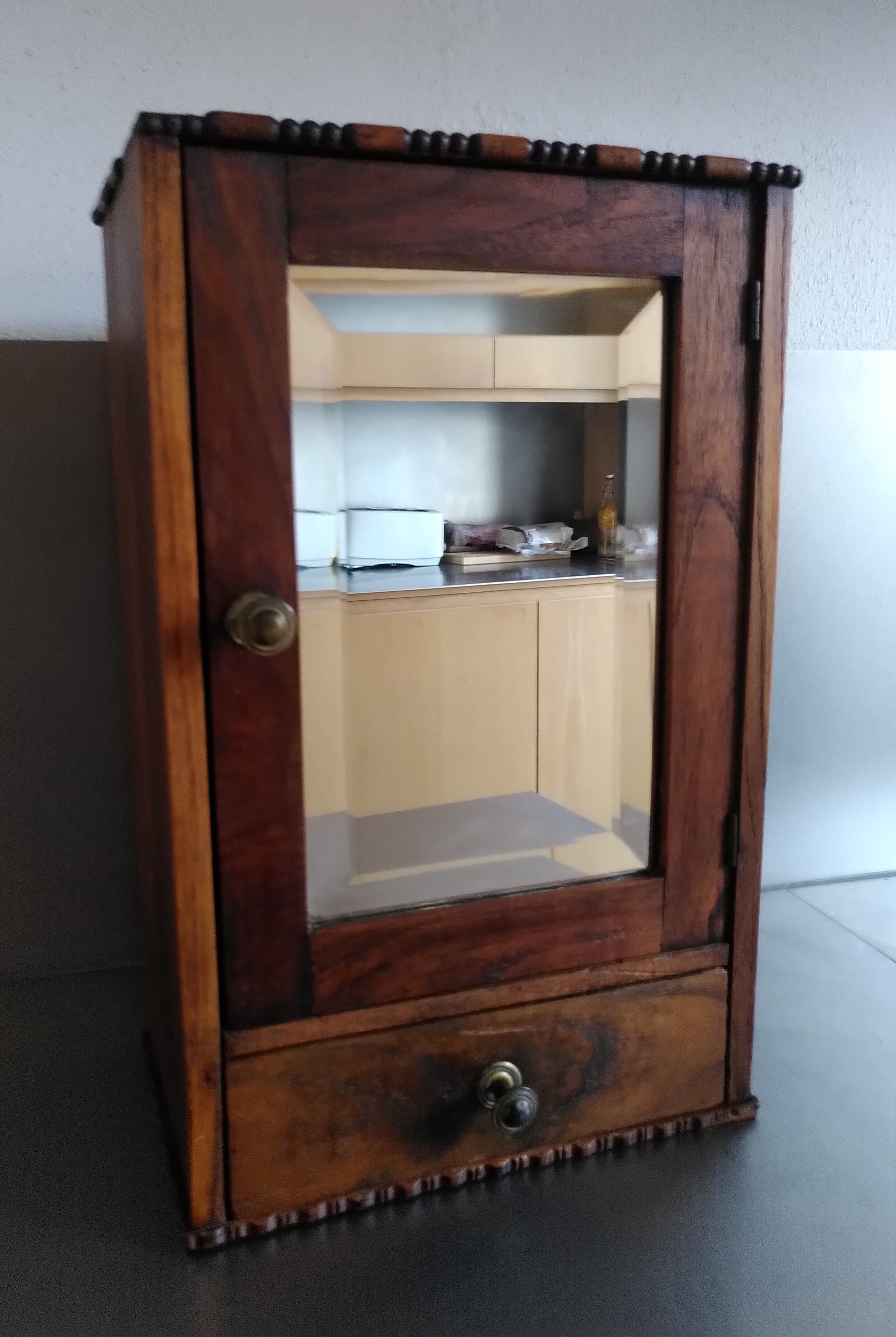 Medicine cabinet with beveled mirror