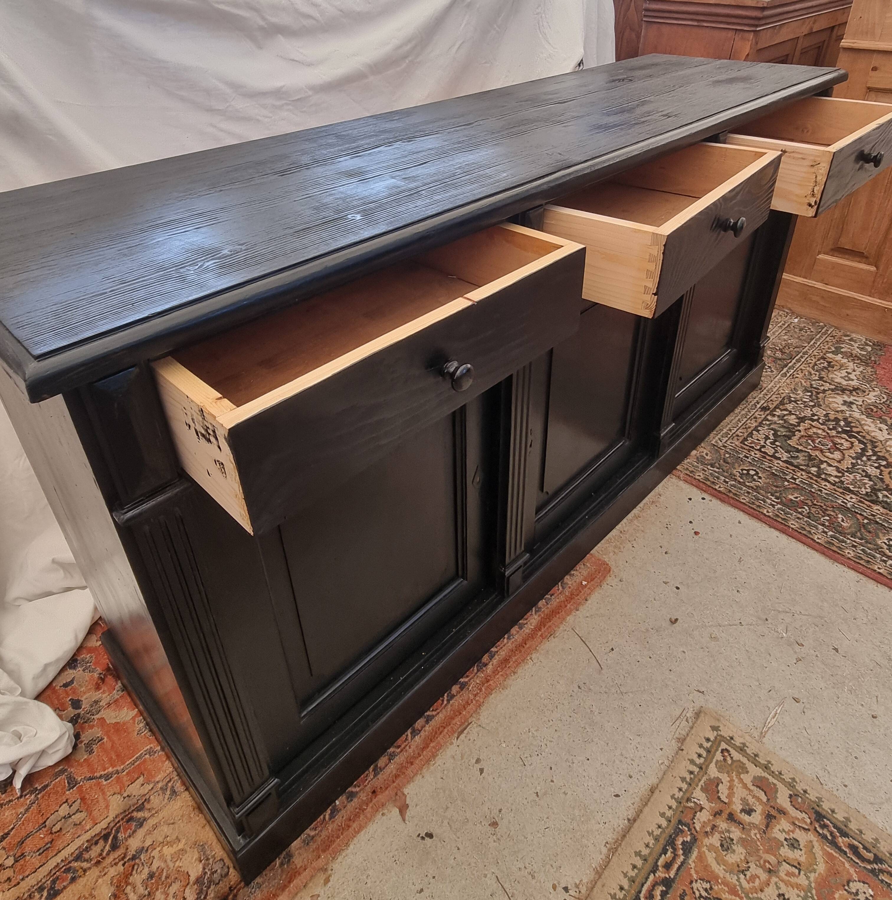 Black patinated chest of drawers