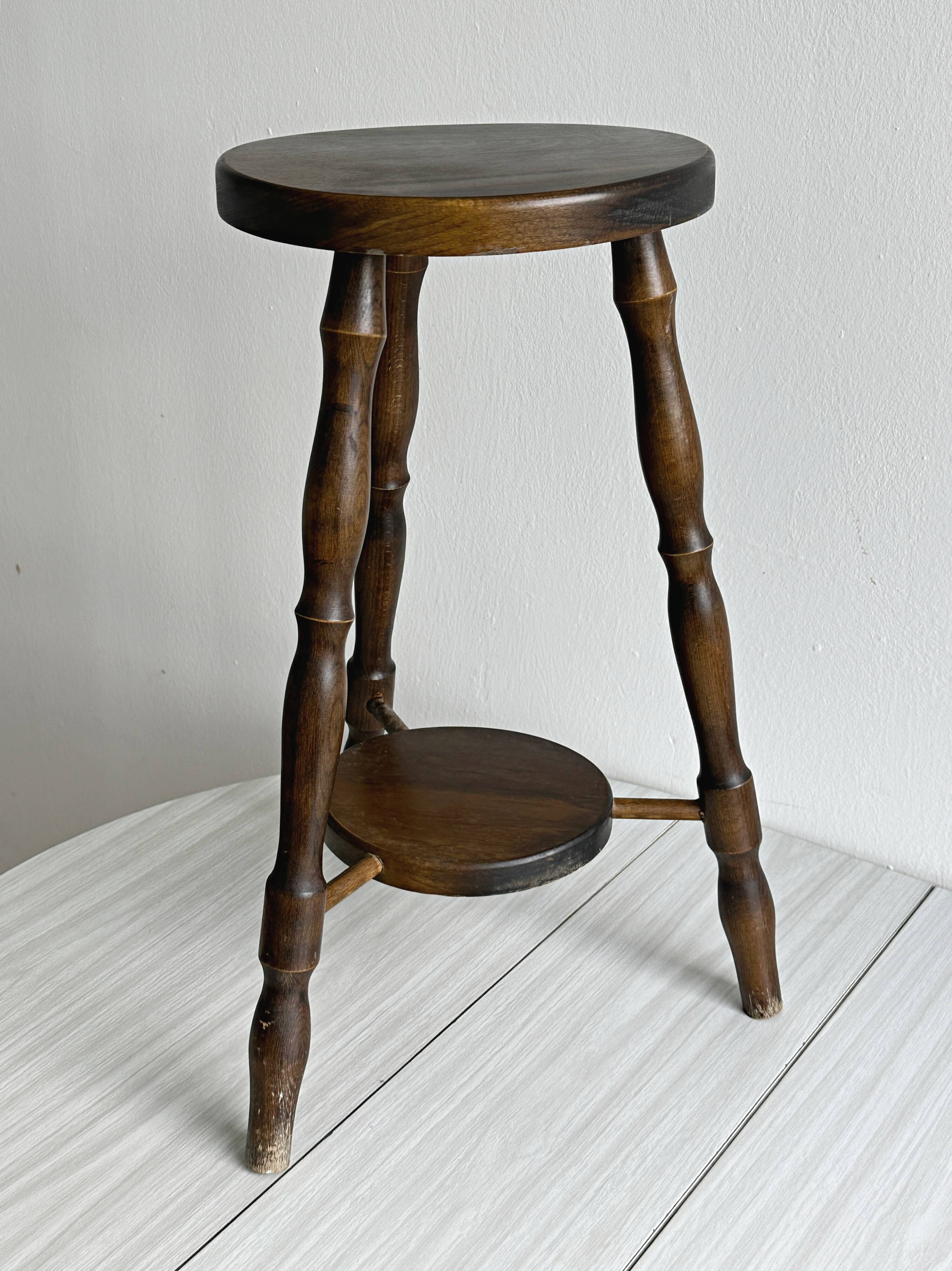 Antique dark wood stool
