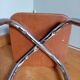 Caramel skaï stool and tapered feet in chrome metal