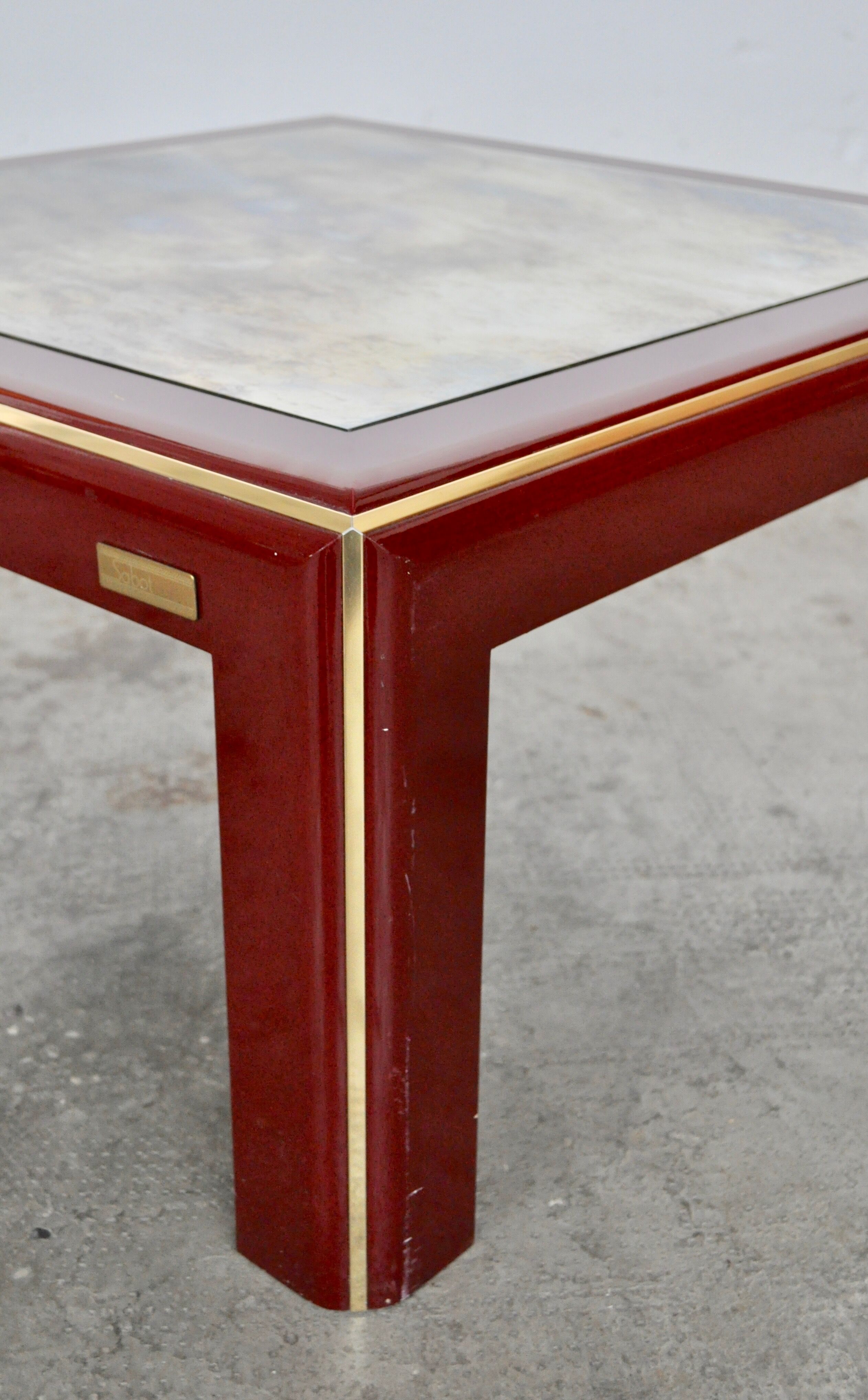 Vintage italian lacquered coffee table with mirror top & brass details from mario sabot