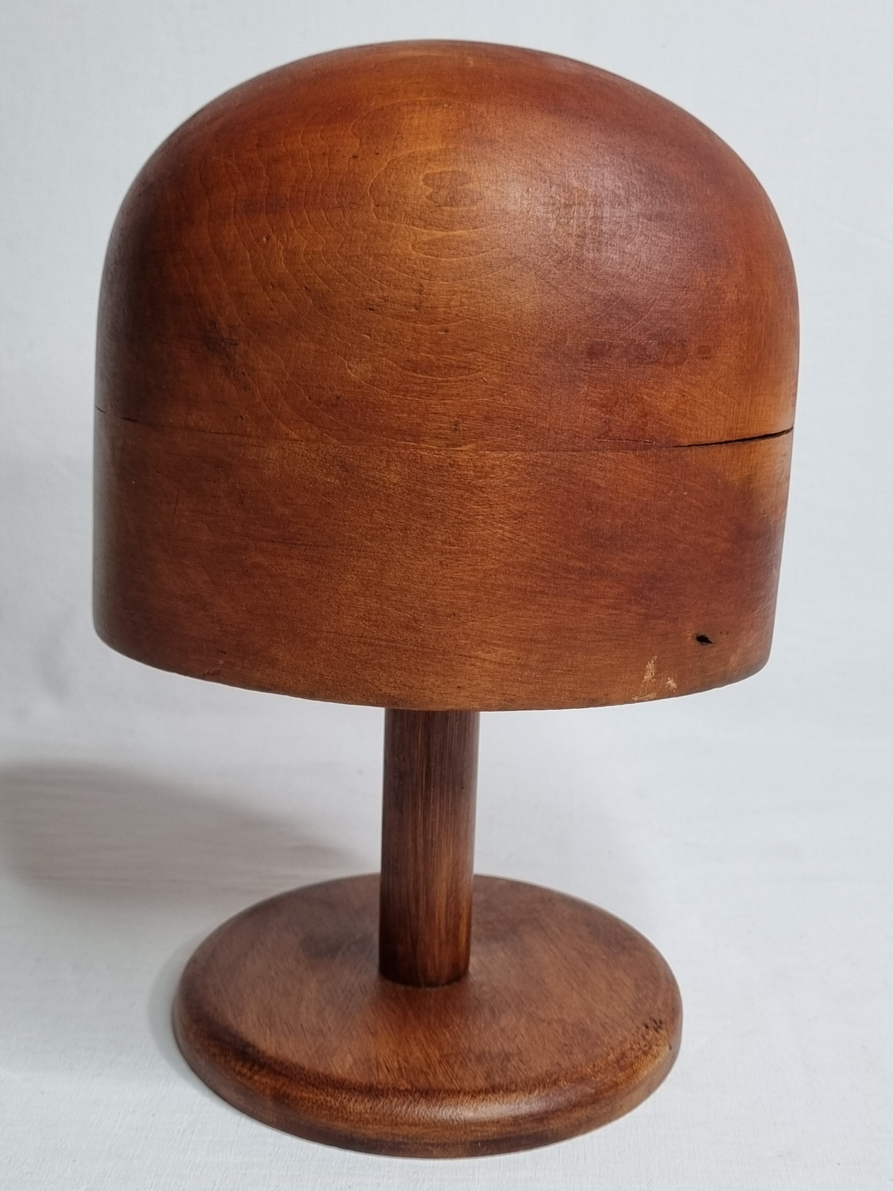 Old wooden hat shape on foot, 1900
