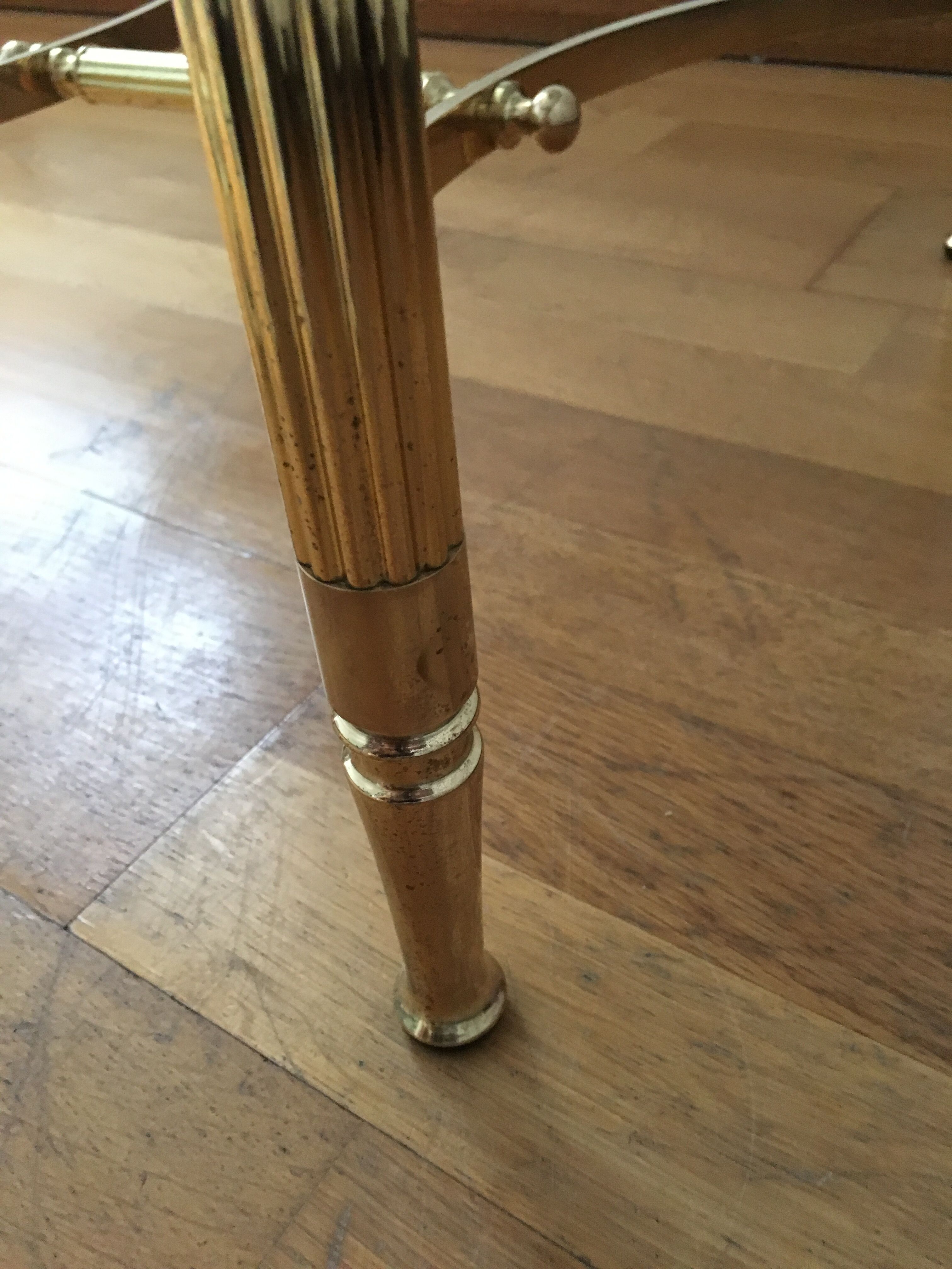 Brass round coffee table and smoked glass